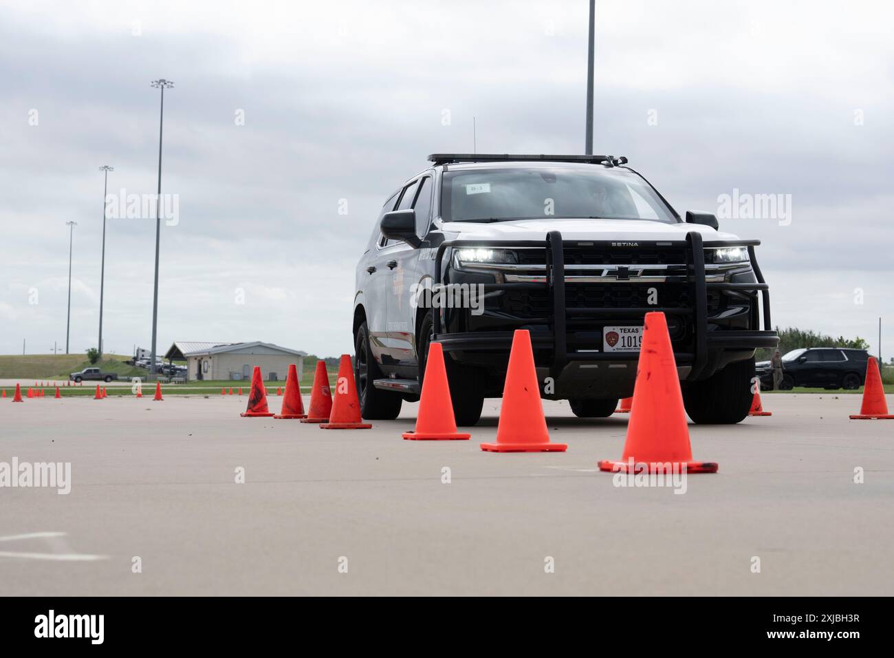 Florence Texas USA, April 23 2024: Texas Department of Public Safety state trooper drives a DPS cruiser on an obstacle course as part of the 12th annual Top Trooper competition. DPS officers competed in physical conditioning, shooting, endurance and driving skills. A total of 120 troopers competed and the two winners were given new patrol vehicles. ©Bob Daemmrich Stock Photo