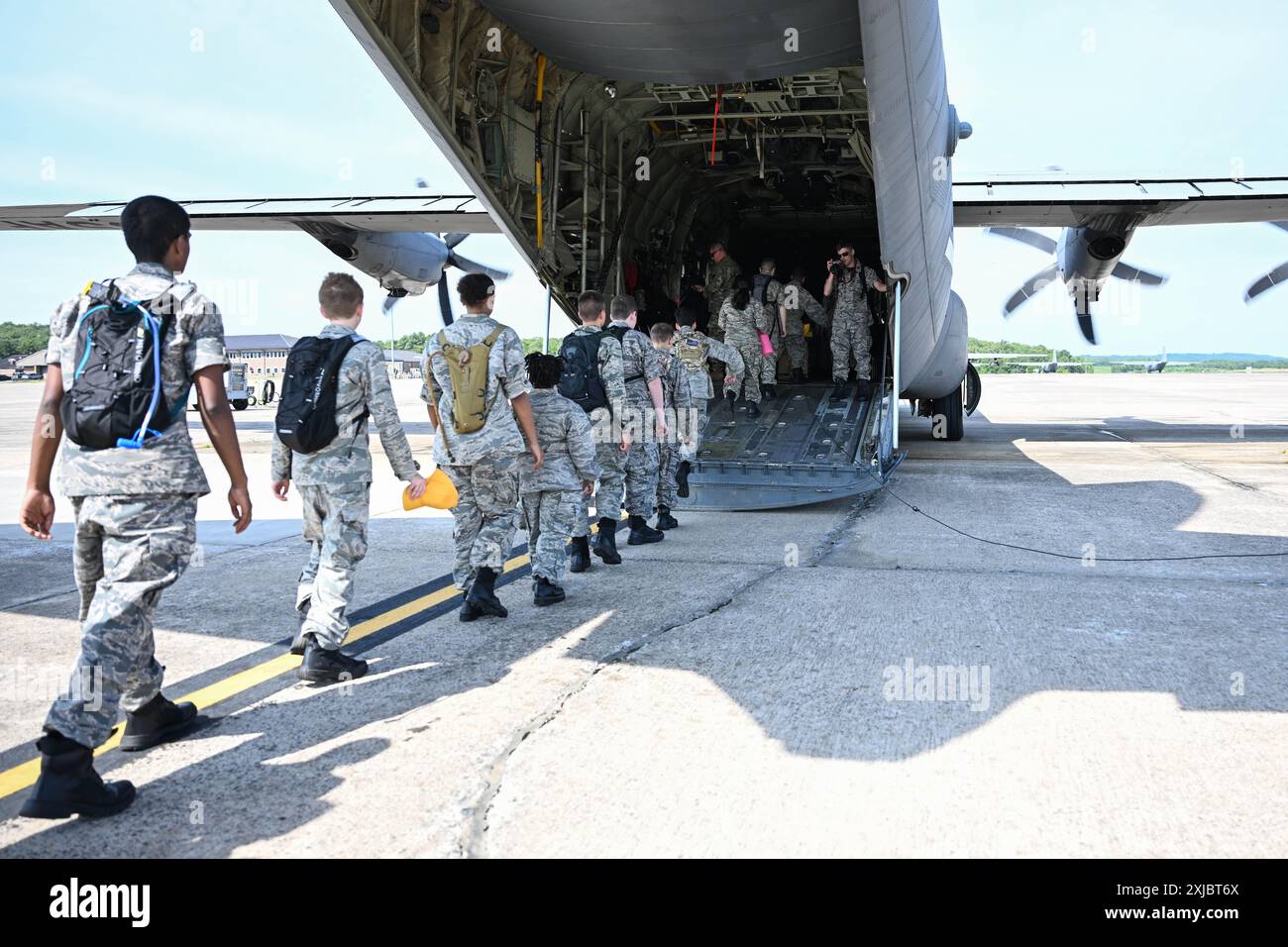 Civil Air Patrol (CAP) cadets walk into a C130J Super Hercules