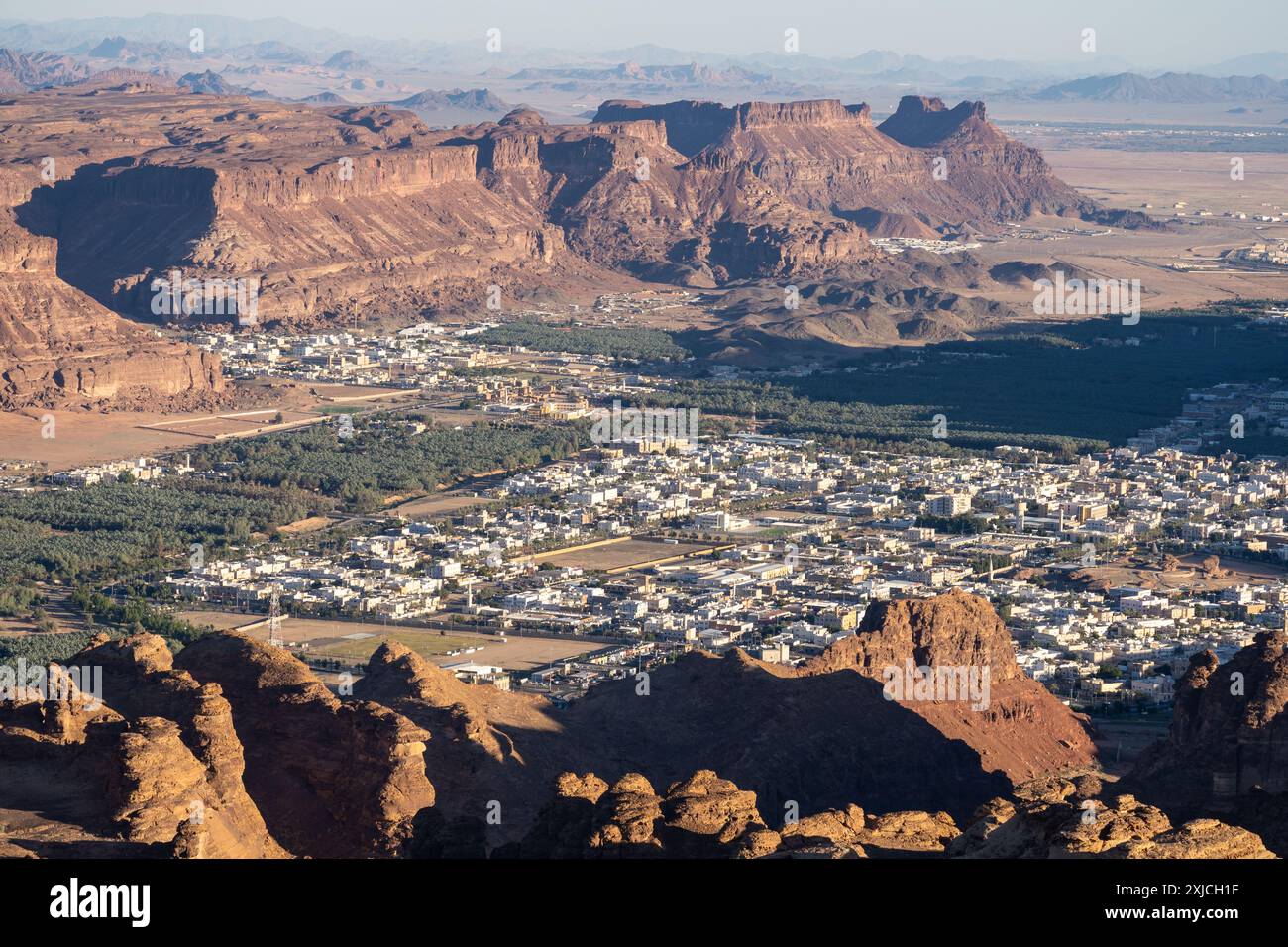 Al Ula, Saudi Arabia: Dramatic panoramic view of the Al Ula landscape famous for its red desert and rock formations and heritage sites in Saudi Arabia Stock Photo