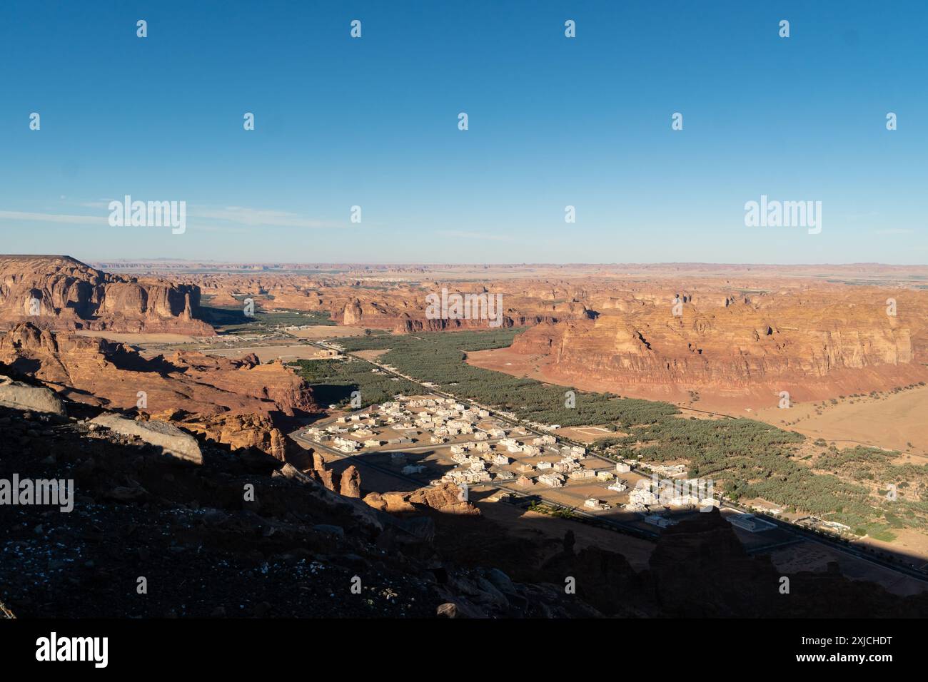 Al Ula, Saudi Arabia: Dramatic panoramic view of the Al Ula landscape famous for its red desert and rock formations and heritage sites in Saudi Arabia Stock Photo