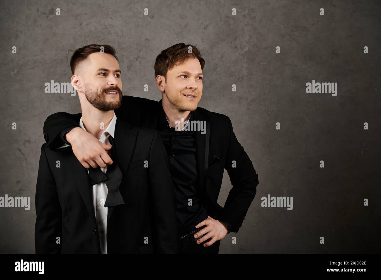 Men in grey suits hi-res stock photography and images - Alamy