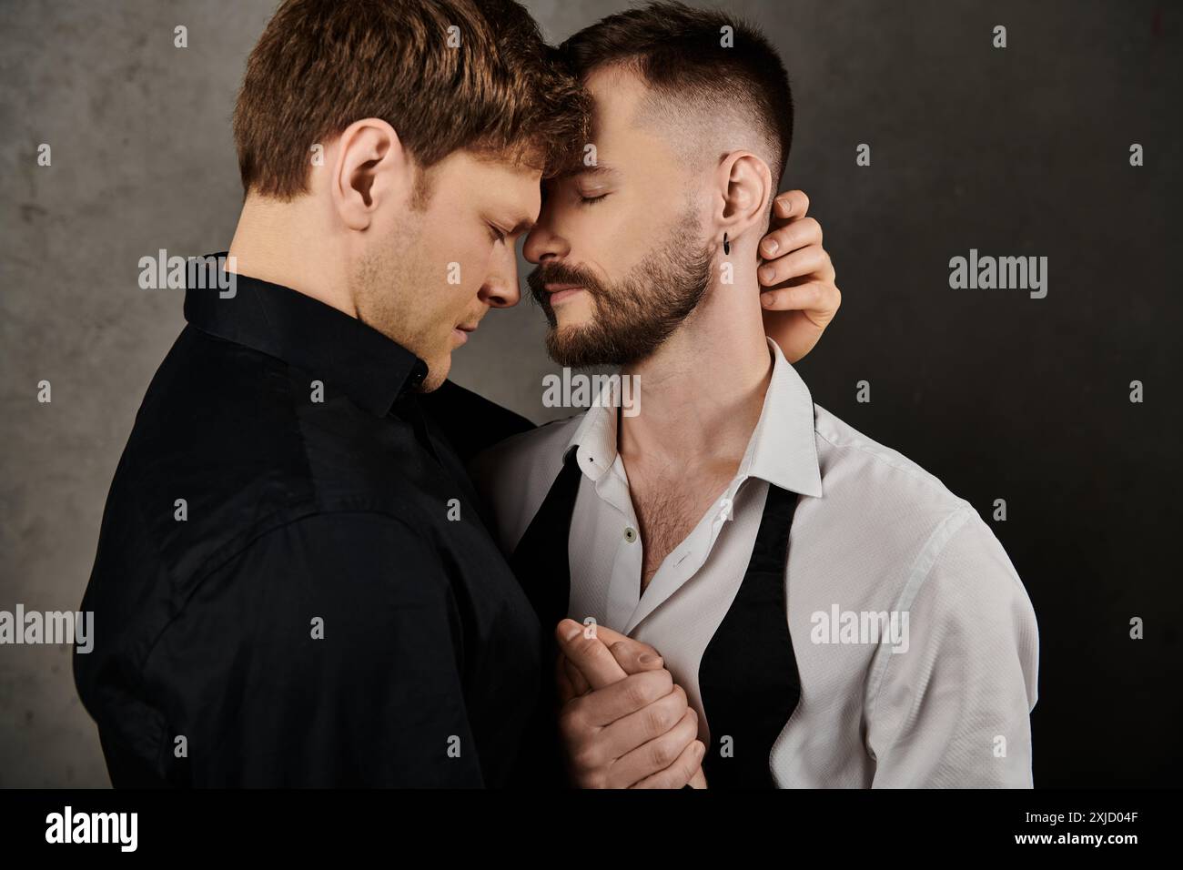 Two gay men face face hi-res stock photography and images - Alamy