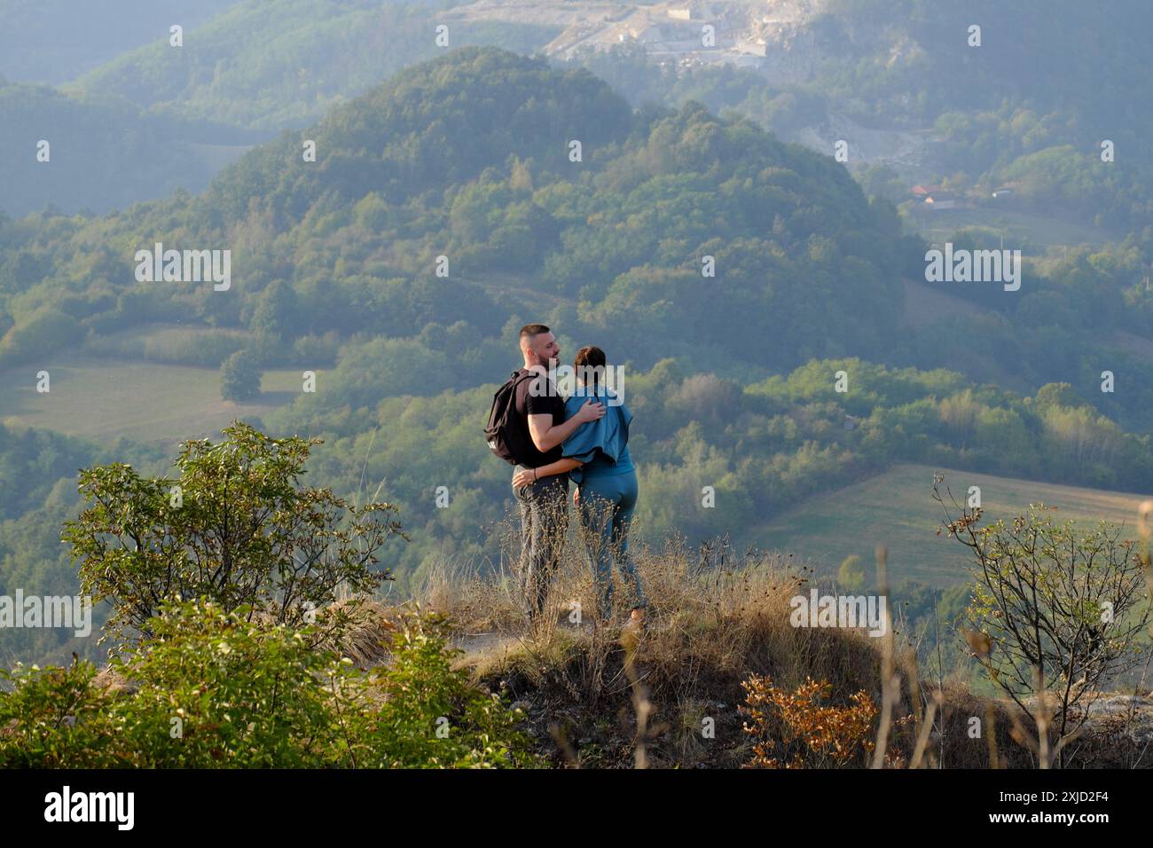 Standing couple hikers overlooking hi-res stock photography and images ...