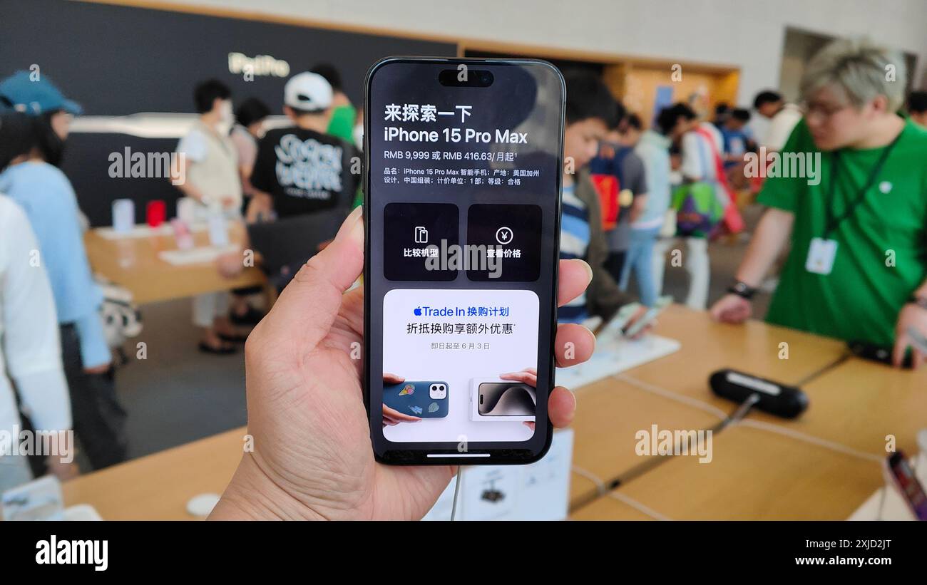 SHANGHAI, CHINA - MAY 24, 2024 - Customers shop for iPhone 15 at the ...