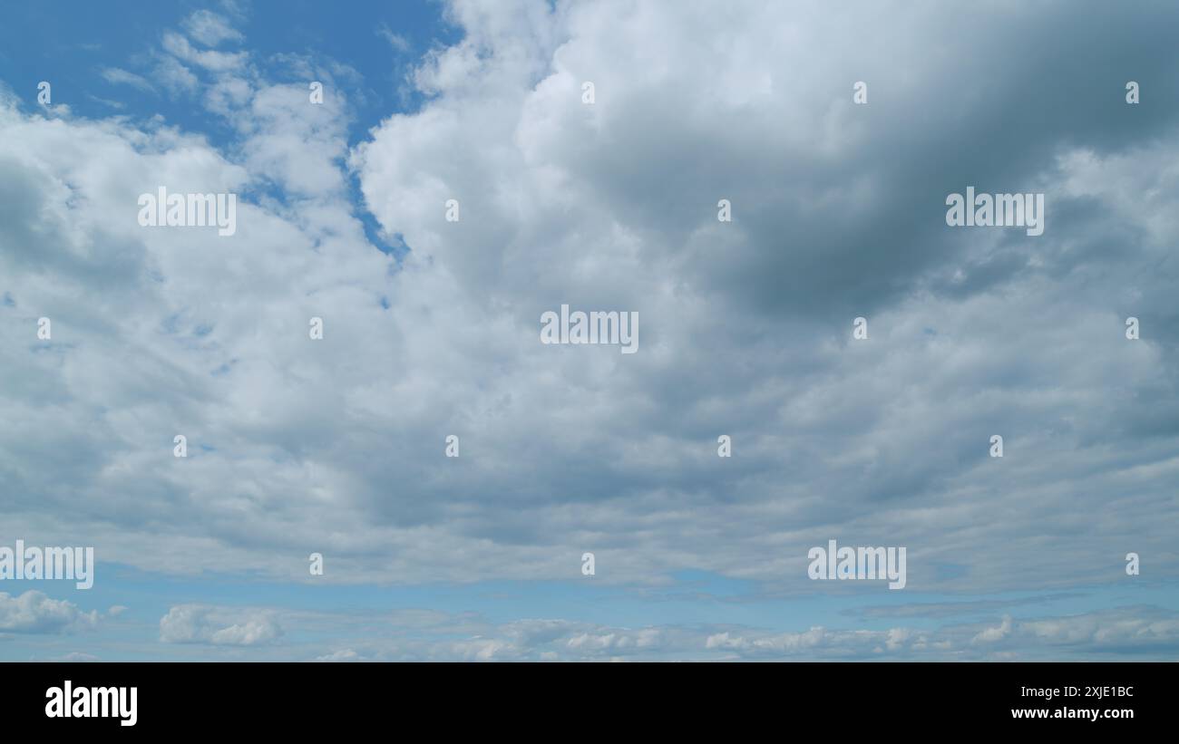 Time lapse forming clouds hi-res stock photography and images - Alamy