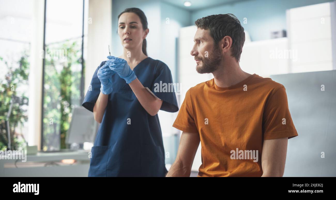 Happy Injection Happy Caucasian Man Sitting In The Chair In Bright Hospital And Getting ...