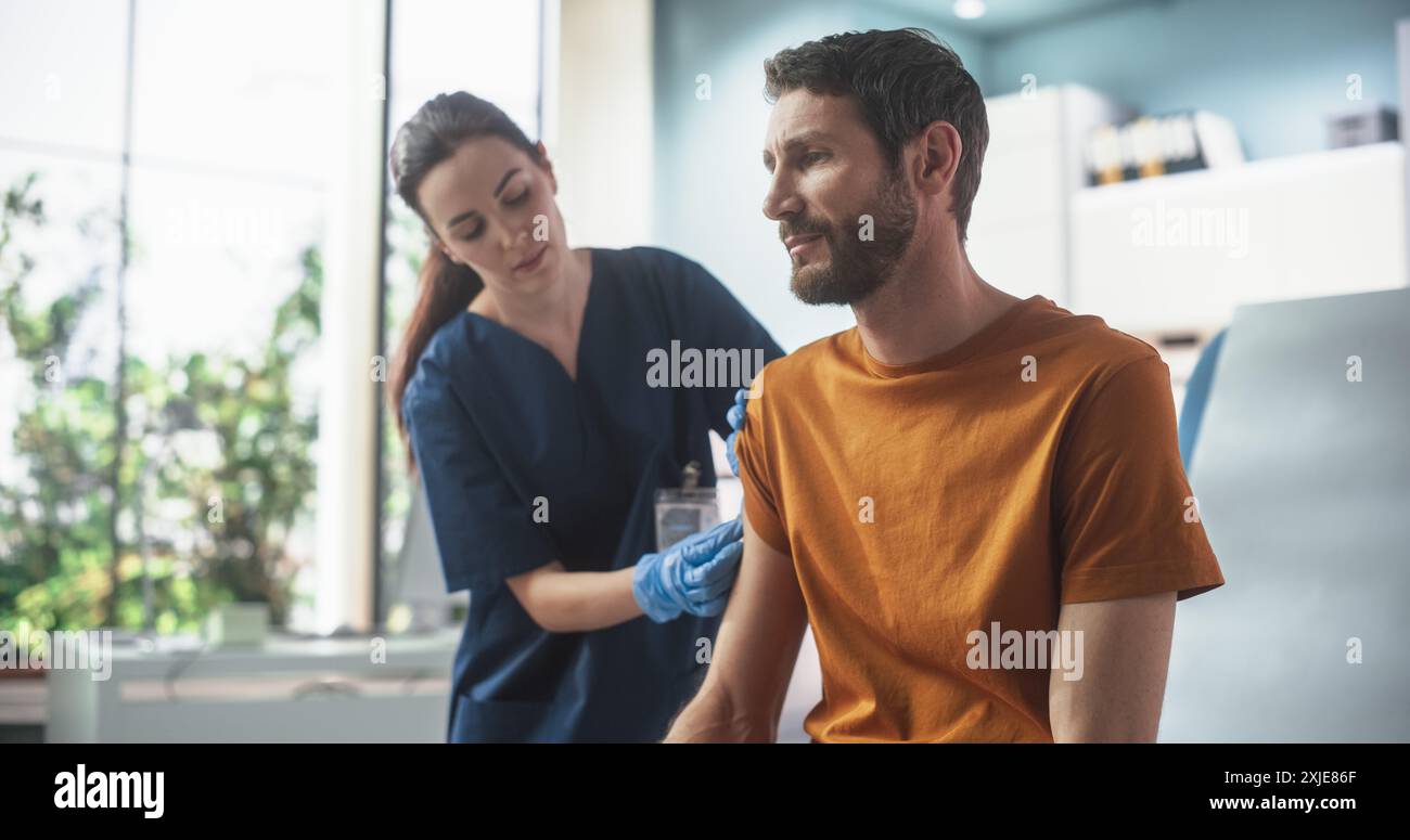 Happy Injection Happy Caucasian Man Sitting In The Chair In Bright Hospital And Getting ...
