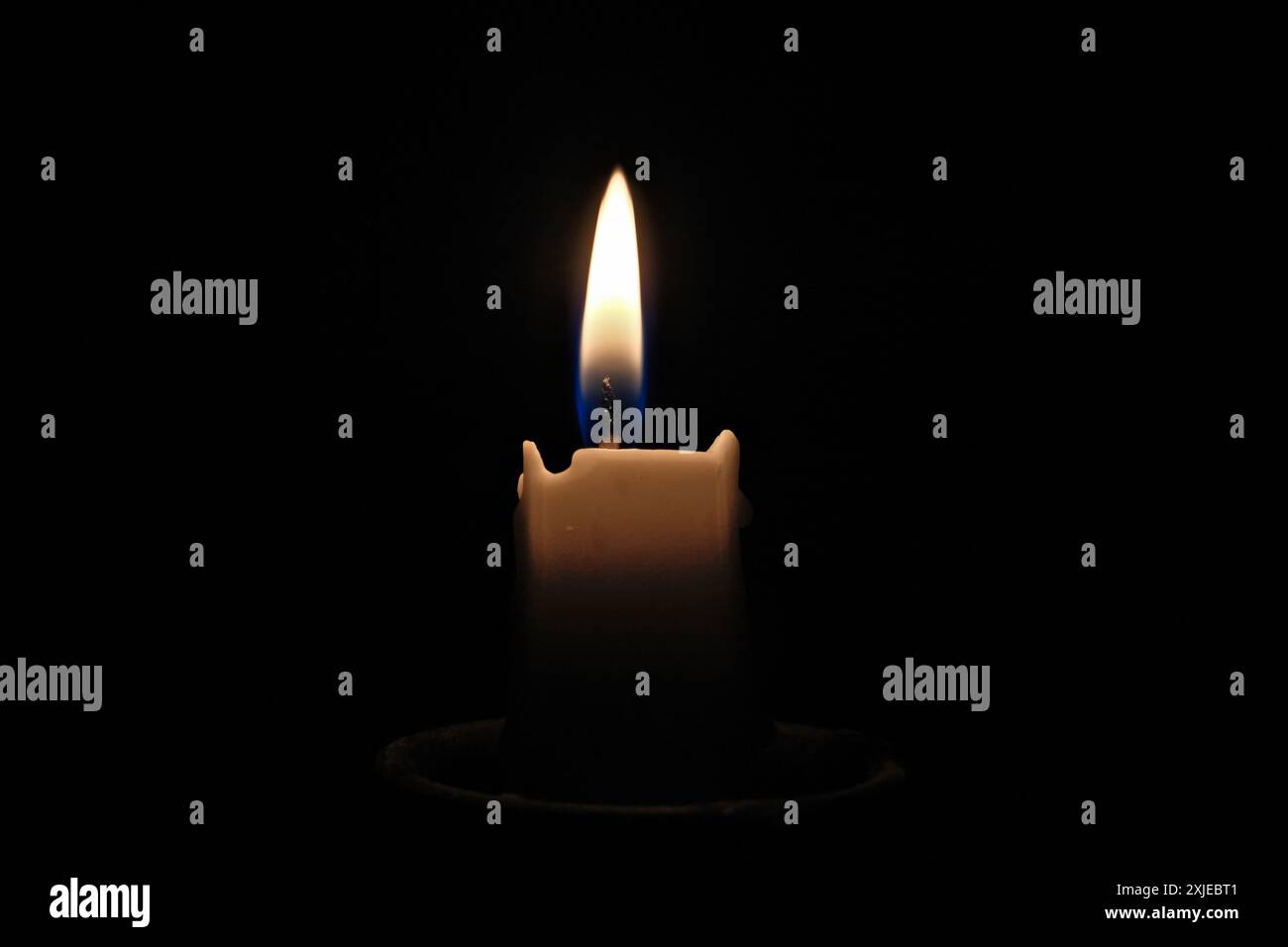 candle light on a black background, close-up of photo Stock Photo - Alamy
