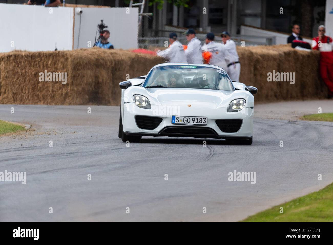 2014 Porsche 918 Spyder hybrid sports car driving up the hill climb track at the Goodwood Festival of Speed 2024 motorsport event, West Sussex, UK Stock Photo