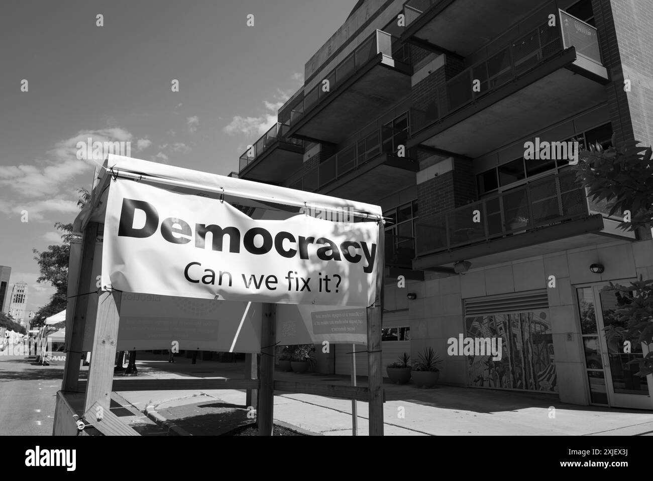 Booth with a sign reading Democracy Can We Fix It? prior to the start of the Ann Arbor Art Fair, Ann Arbor Michigan USA Stock Photo