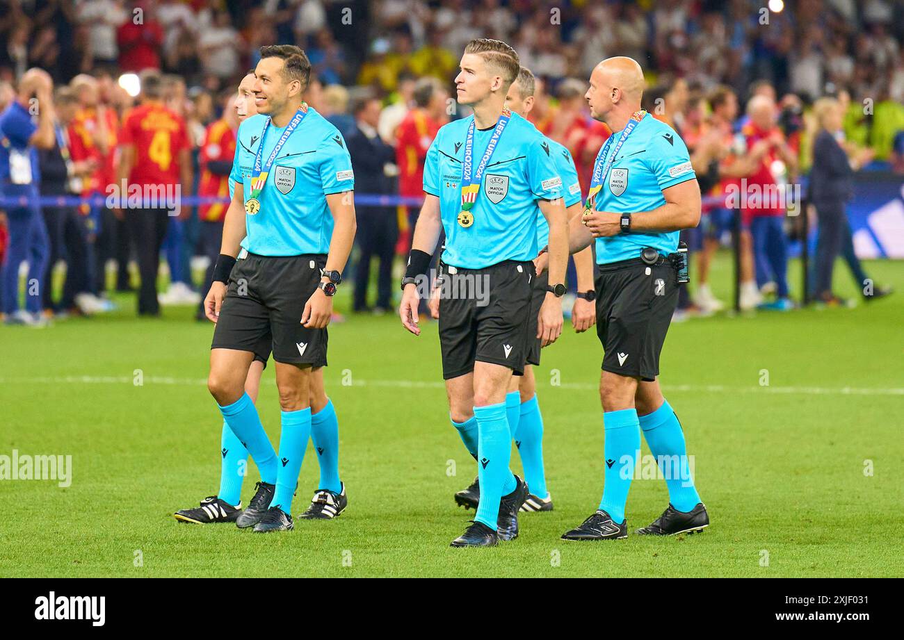 Schiedsrichterteam beim Endspiel der UEFA EURO 2024 Schiedsrichter: François Letexier (Frankreich) Schiedsrichterassistenten: Cyril Mugnier, Mehdi Rahmouni (beide Frankreich) Vierter Offizieller: Szymon Marciniak (Polen) Ersatz-Schiedsrichterassistent: Tomasz Listkiewicz (Polen) in the final match  SPAIN - ENGLAND 2-1 of the UEFA European Championships 2024  on Jul 14, 2024  in Berlin, Germany.  Photographer: Peter Schatz Stock Photo