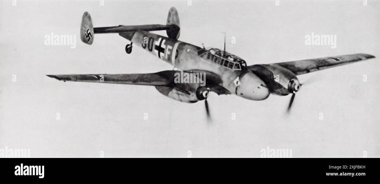 A photograph of a Messerschmitt Bf 110 (destroyer) aircraft, part of the German Air Force (Luftwaffe), taken during the Second World War. This aircraft was involved in the invasion of Poland in 1939 and later advanced onto the Eastern Front. The Bf 110 played a significant role in providing air support and engaging enemy aircraft, contributing to the rapid German advances during these campaigns. Stock Photo