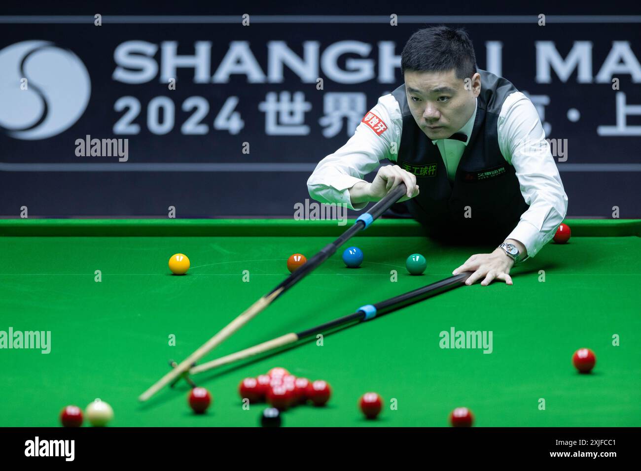 SHANGHAI, July 18, 2024 Ding Junhui of China competes during the
