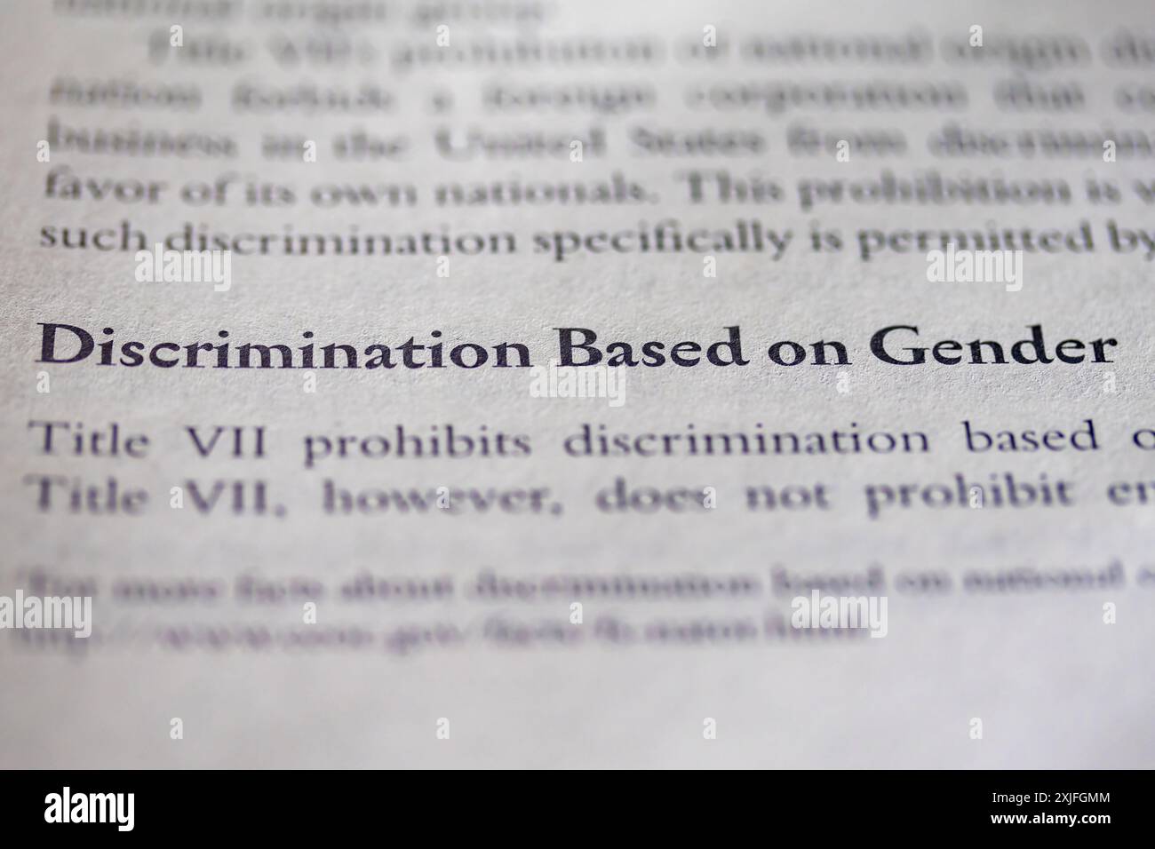 gender discrimination based on gender printed in text on page as visual aid or business law reference Stock Photo