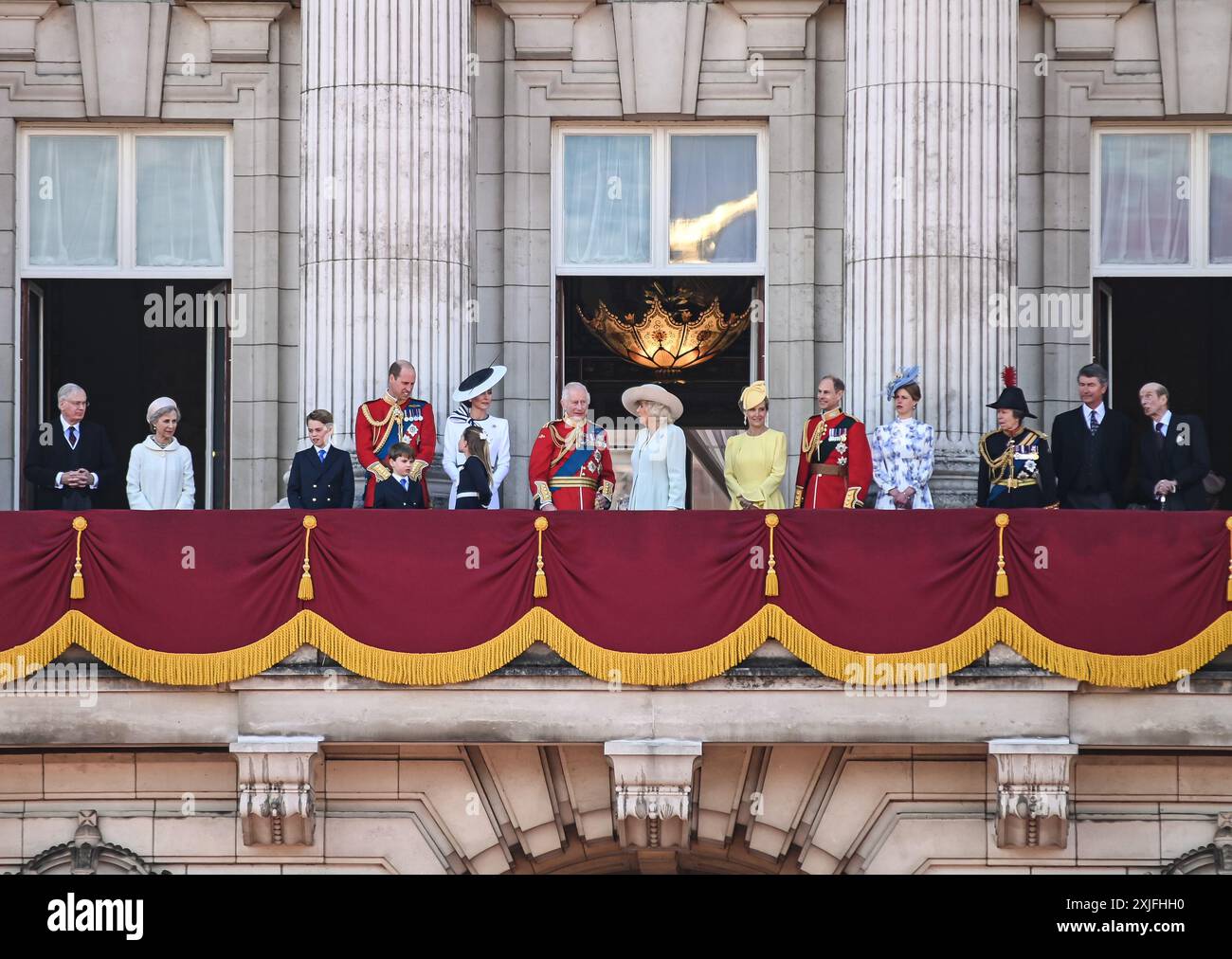 The Royals wave on to the public from the balcony at the Trooping the