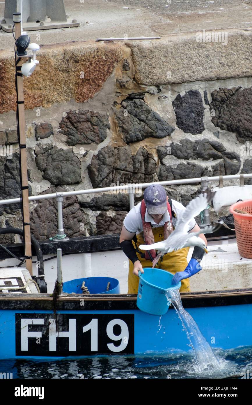 Lizard Fishinerman Around Coverack a fishing village with beach and harbour on the Lizard ...