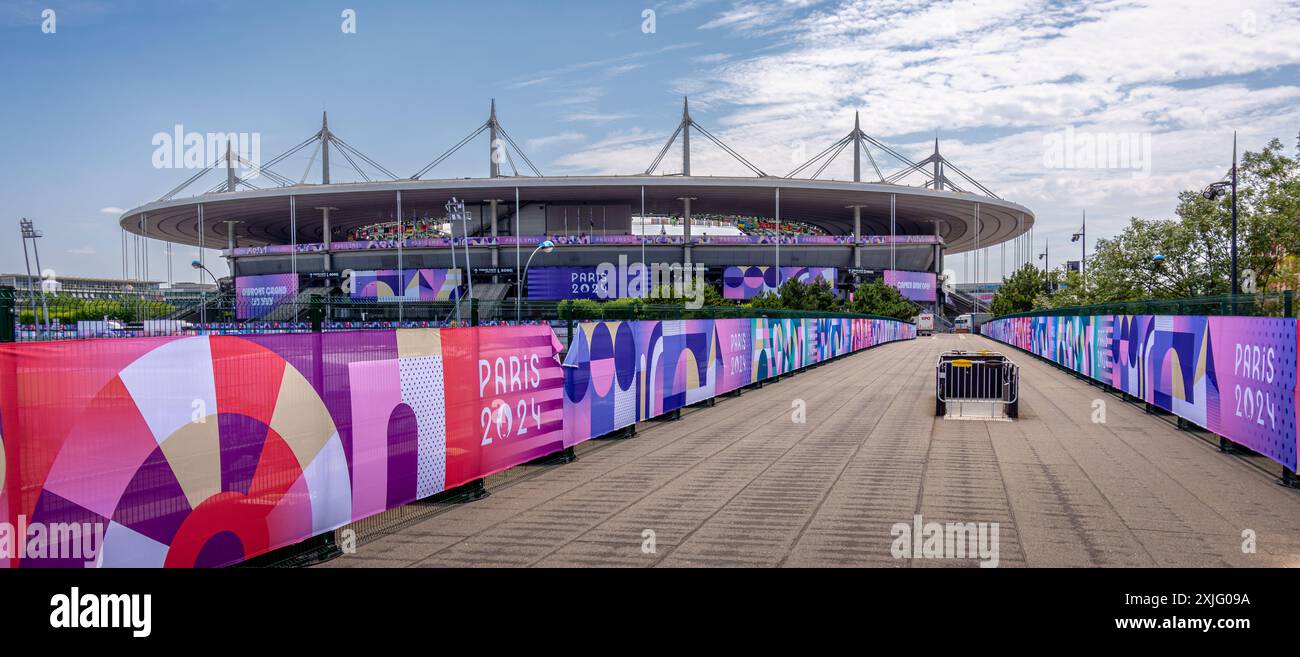 Distant view of Stade de France, the largest French stadium and an Olympic venue decorated for the Paris 2024 Summer Olympics, Saint-Denis, France Stock Photo