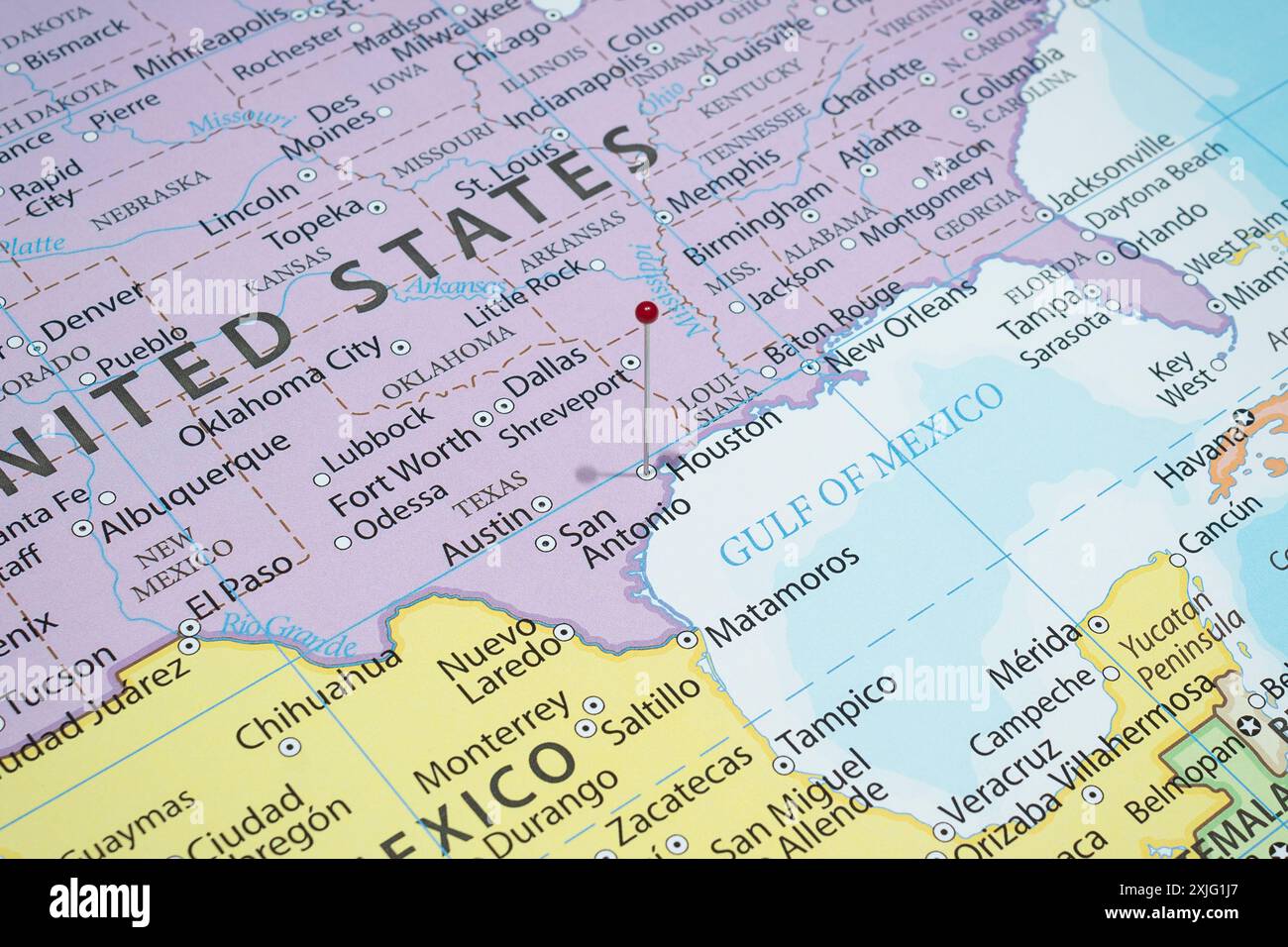 Close up to a Houston city with a red pin needle into United States of ...