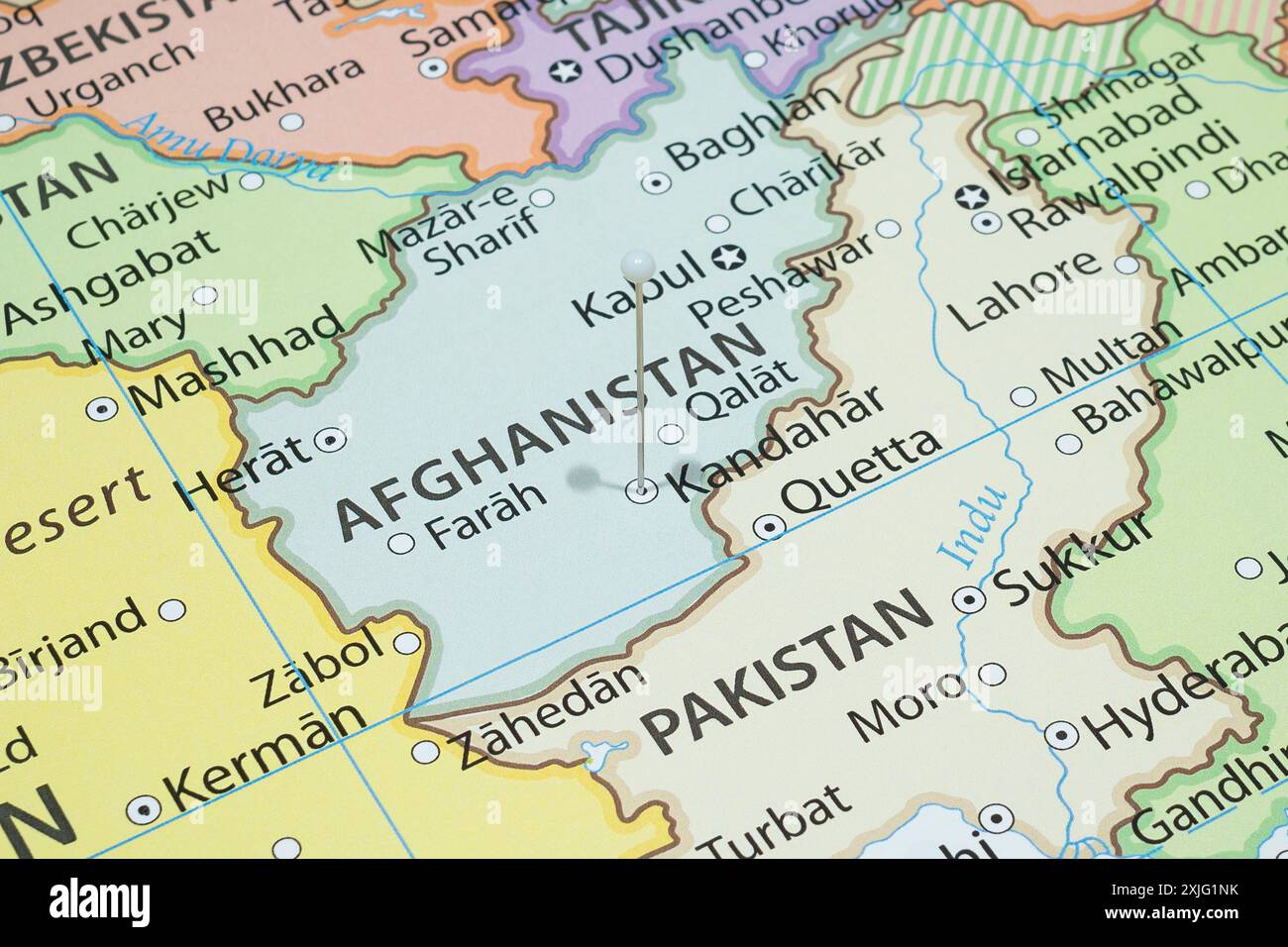 Close up to a Kandahar city with a white pin needle into Afghanistan country political map Stock Photo