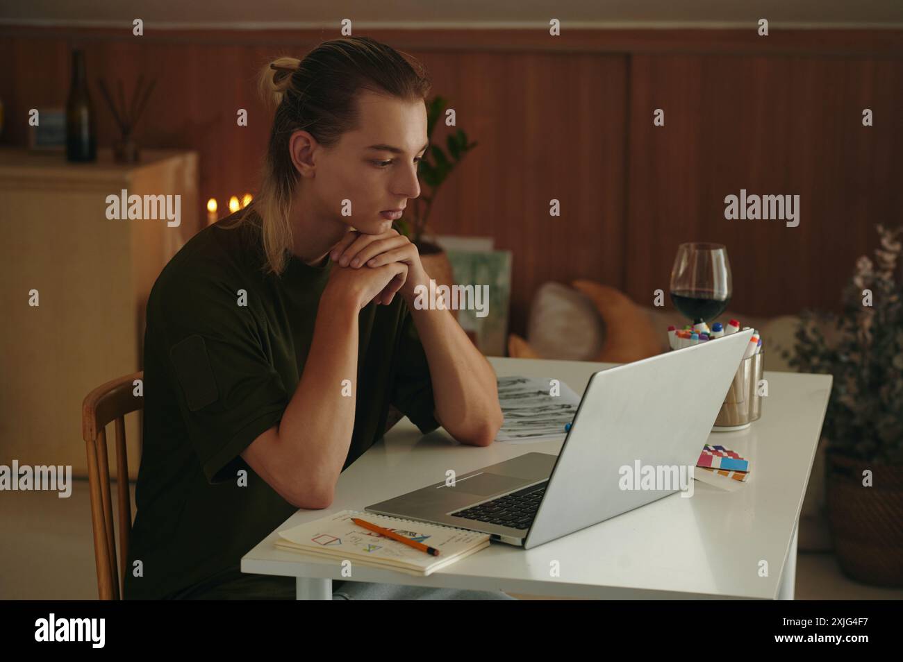 Graphic Designer Using Laptop At Work Stock Photo