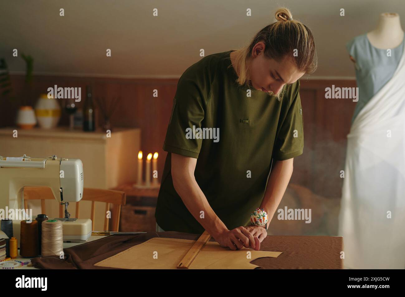 Designer Working With Patterns In Workshop Stock Photo