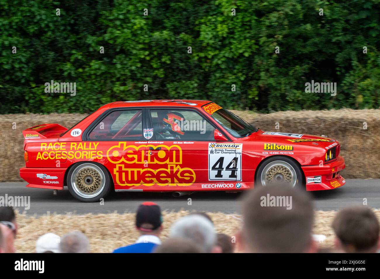 1987 BMW E30 M3 race car driving up the hill climb track at the ...