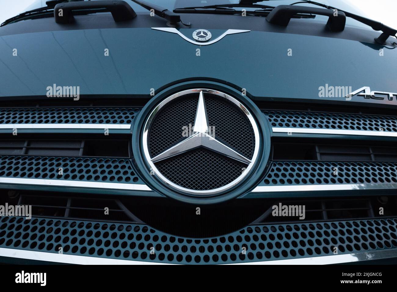 Daimler Mercedes Benz logo on an Actros truck Stock Photo