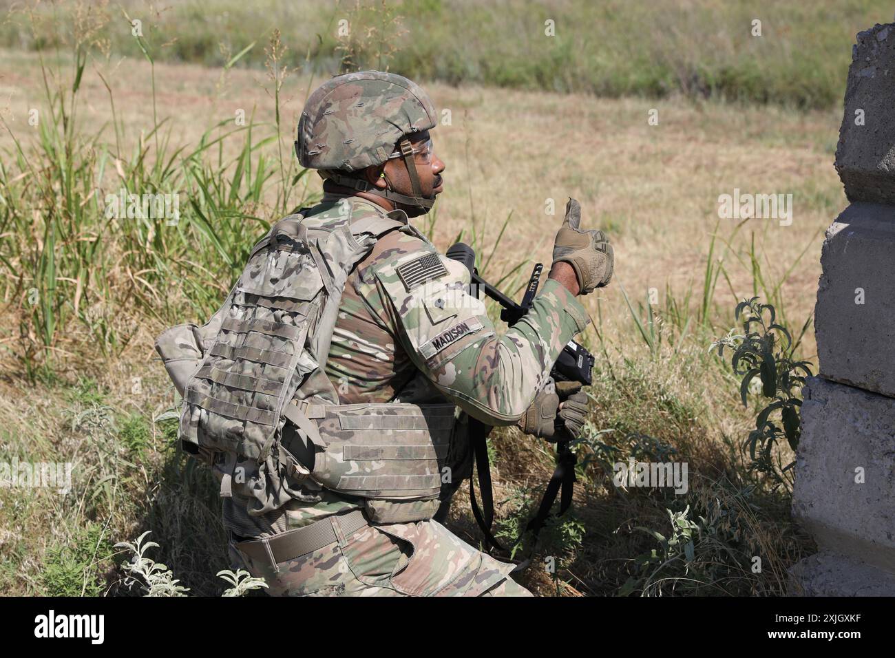 U.S. Army soldiers from the 3rd Battalion, 2nd Air Defense Artillery Regiment, participate in a Grenade Launcher Module (M320)  Range to qualify on the unit's weapon system. Stock Photo