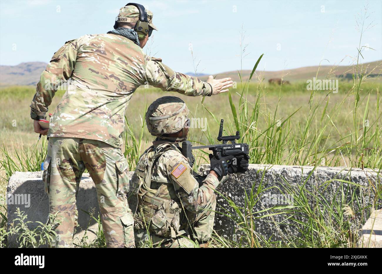 U.S. Army soldiers from the 3rd Battalion, 2nd Air Defense Artillery Regiment, participate in a Grenade Launcher Module (M320)  Range to qualify on the unit's weapon system. Stock Photo