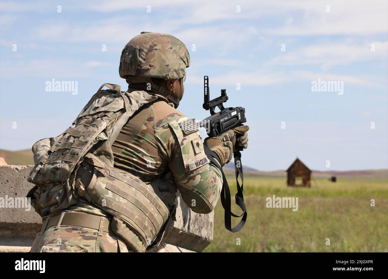 U.S. Army soldiers from the 3rd Battalion, 2nd Air Defense Artillery Regiment, participate in a Grenade Launcher Module (M320)  Range to qualify on the unit's weapon system. Stock Photo