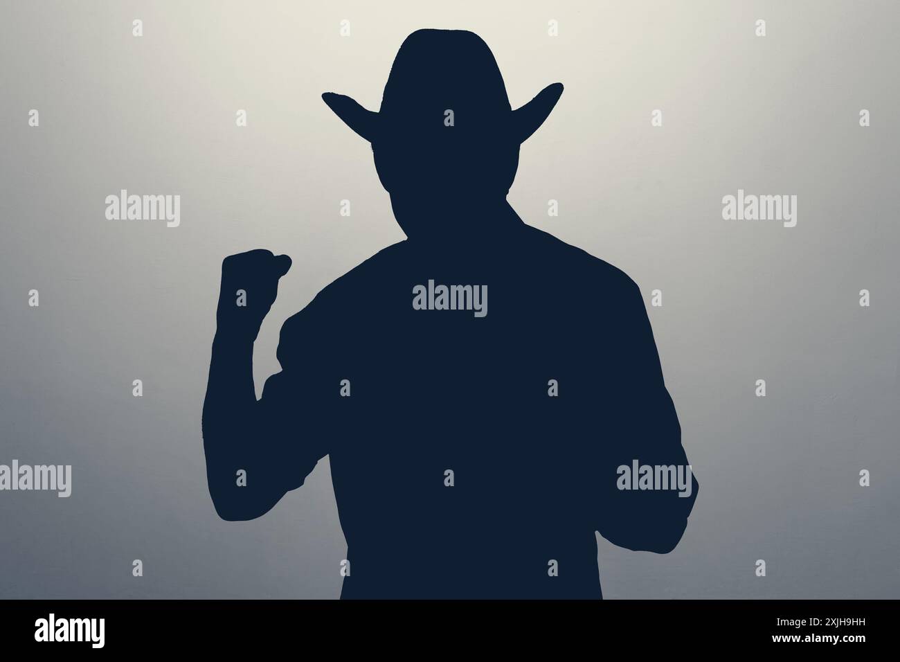 one man angry fisting up silhouette standing Stock Photo - Alamy