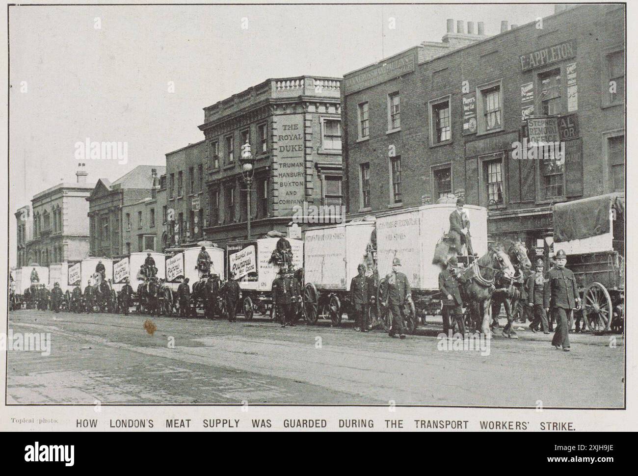 How London's meat supply was guarded during the transport workers' strike.  policemen guarding meat wagons during the transport workers' strike.  1912-07-10 Stock Photo