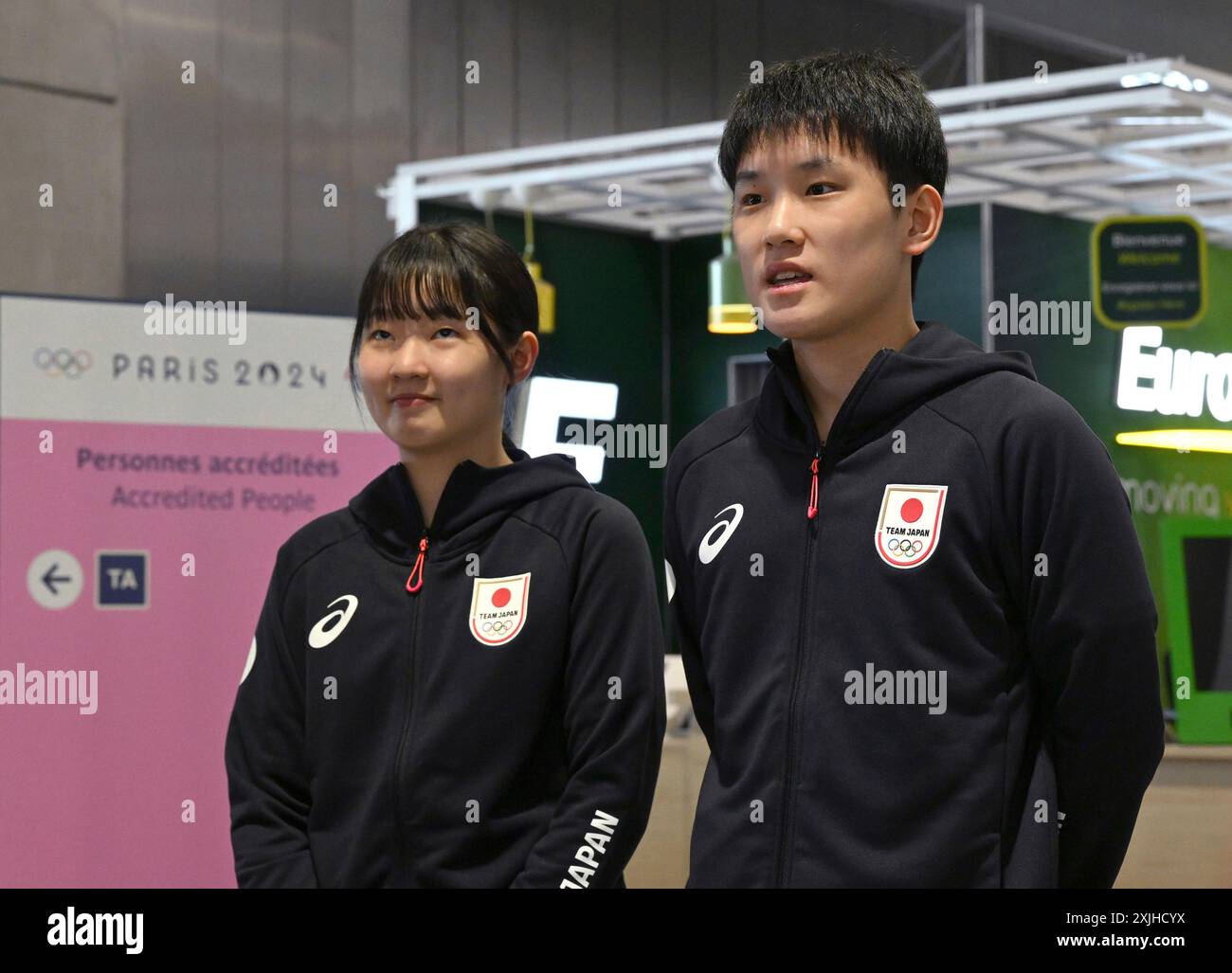 Japanese table tennis players Miwa Harimoto (L) and Tomokazu Harimoto