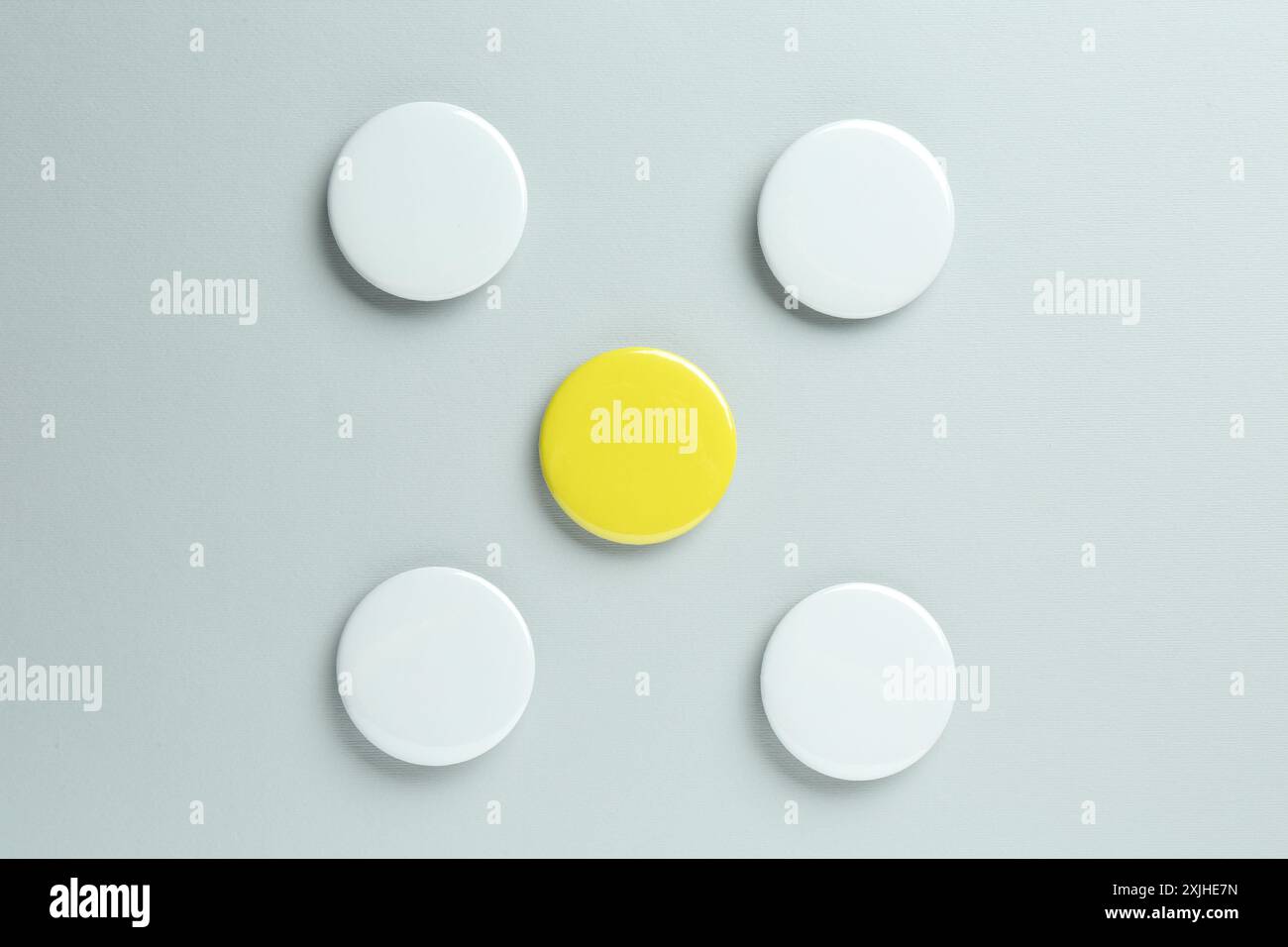 Blank button badges on light background, flat lay. Mockup for design Stock Photo
