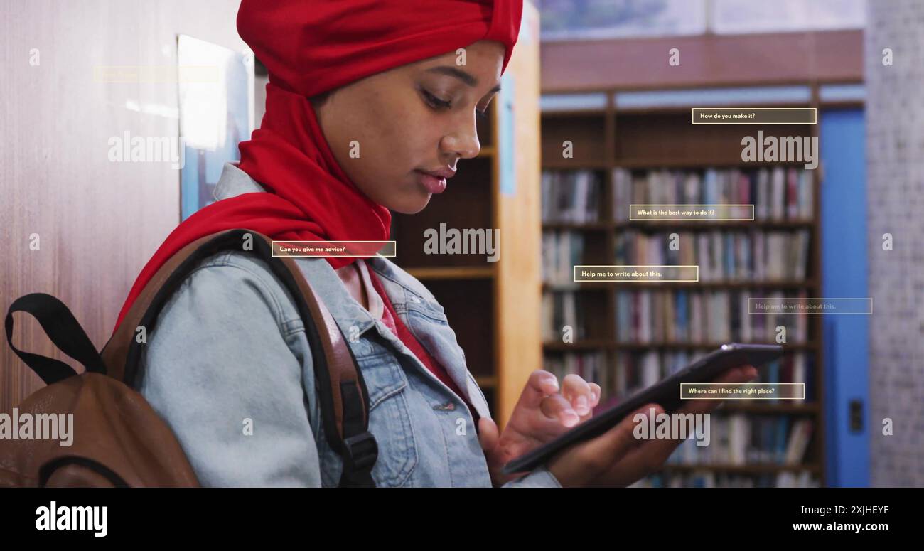 Image of ai text and data over biracial female student in hijab with tablet. Global artificial intelligence, connections, computing and data processin Stock Photo
