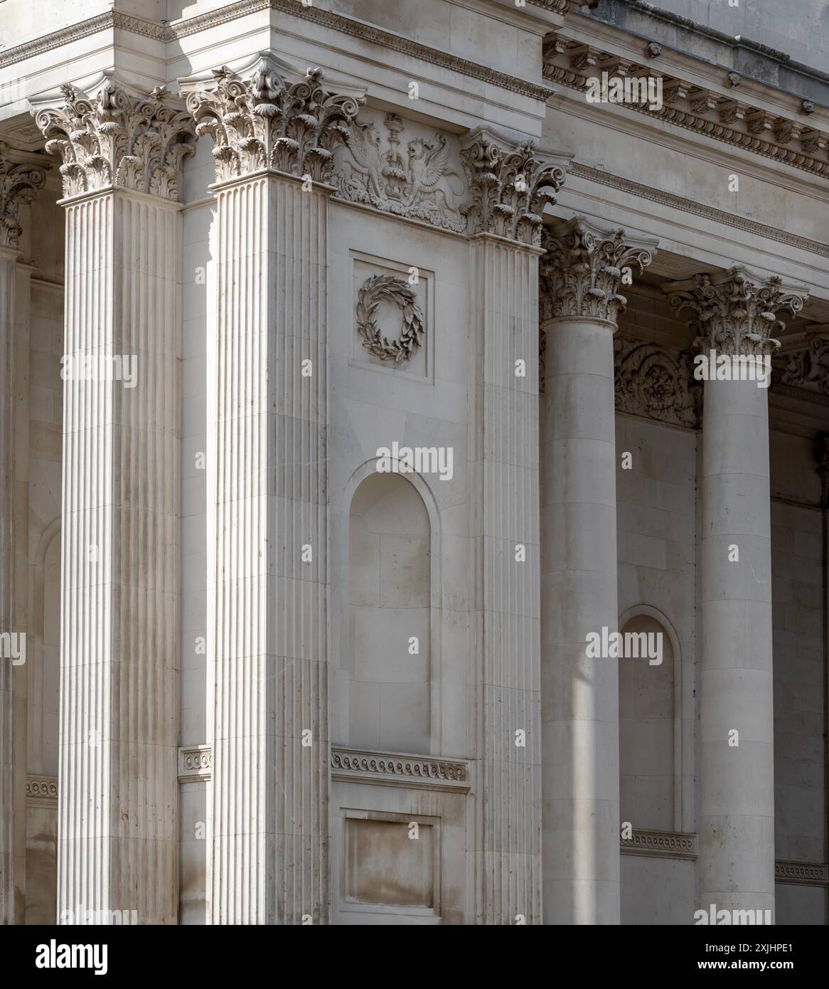 Ornate columns and intricate carvings adorn the facade of a historic ...