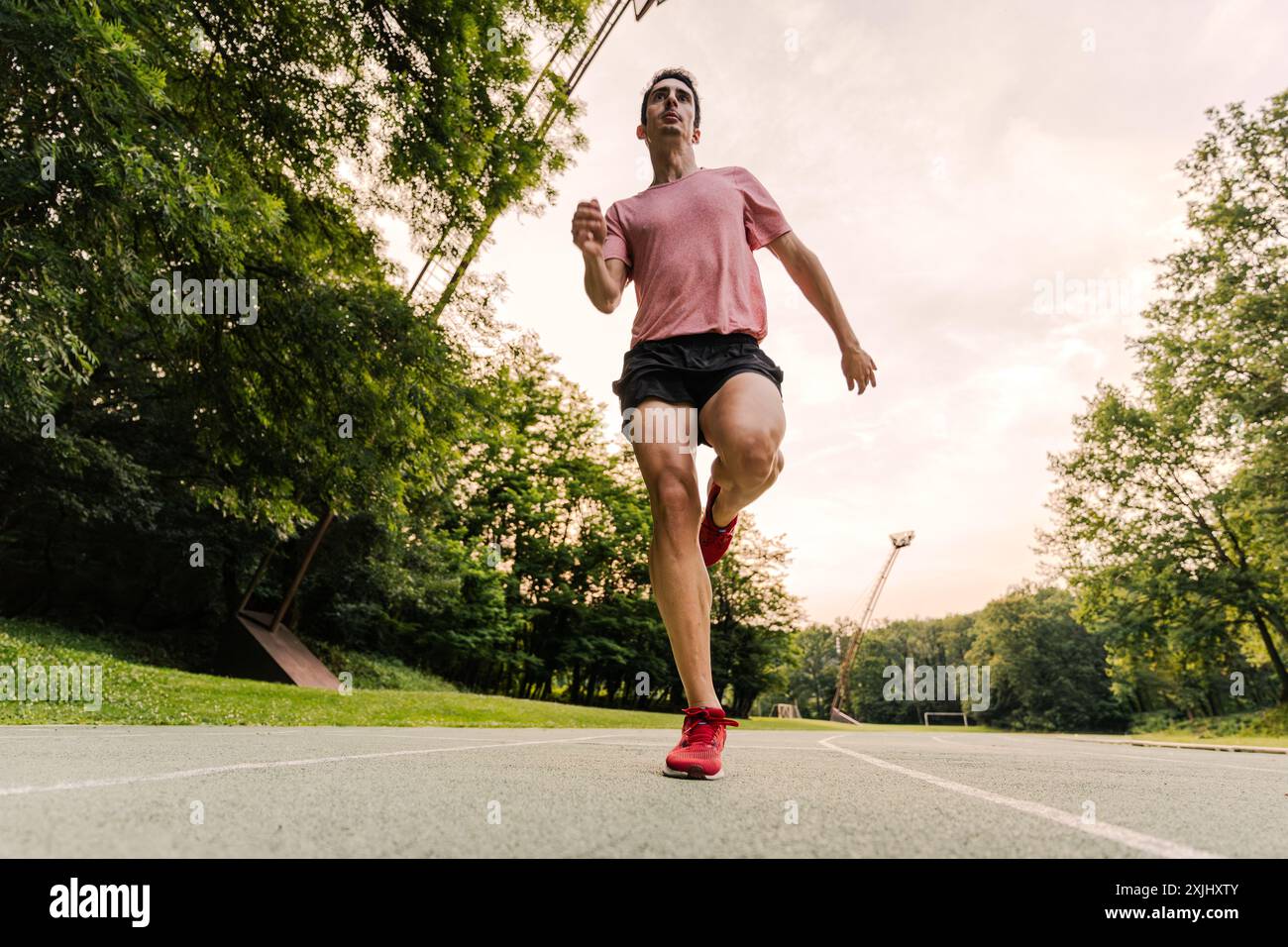 Long distance runner stretching hi-res stock photography and images - Alamy