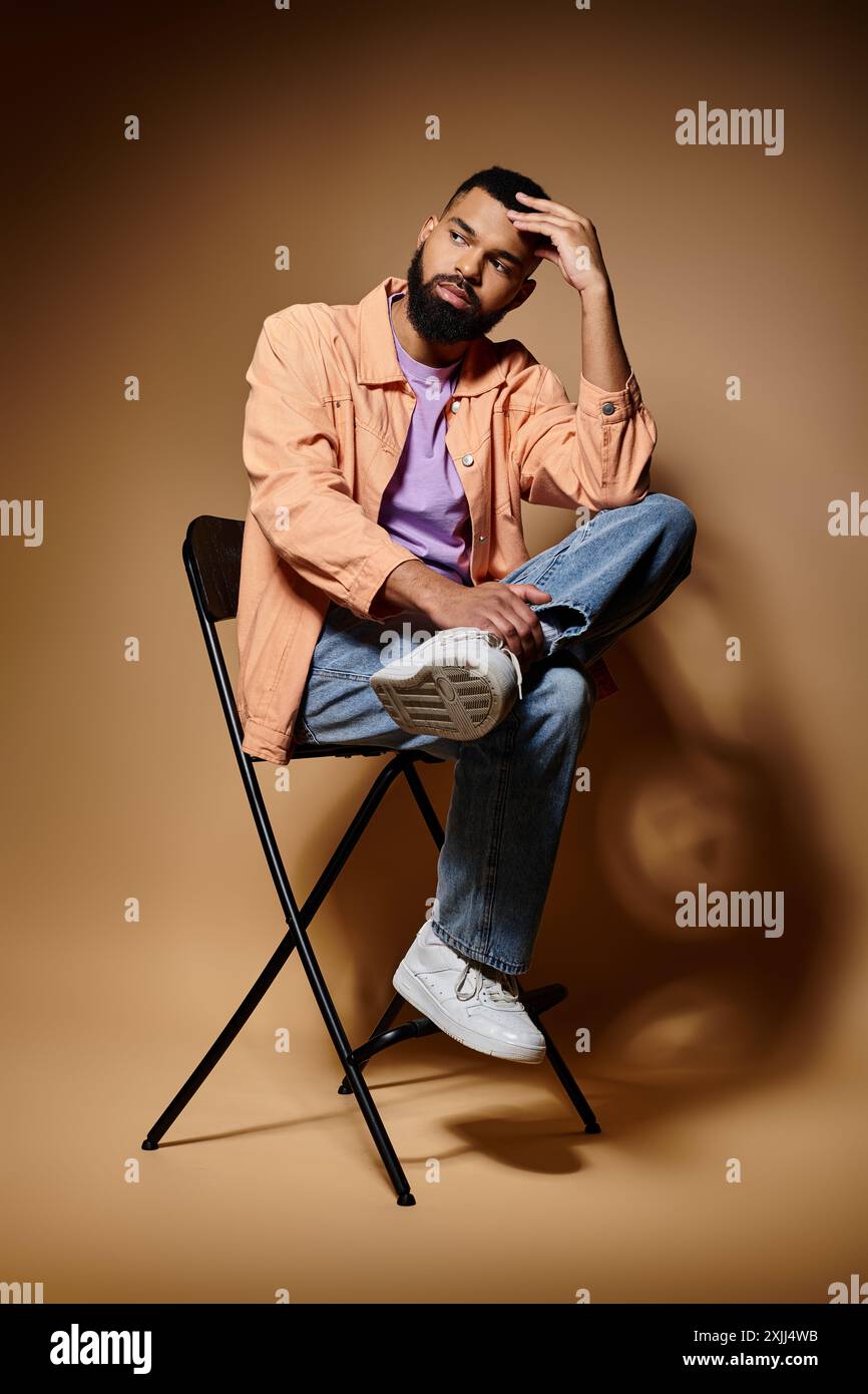 Man sitting head against hand hi-res stock photography and images - Alamy