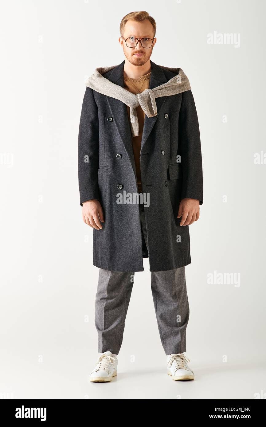 Young man in formal attire poses confidently hi-res stock photography ...