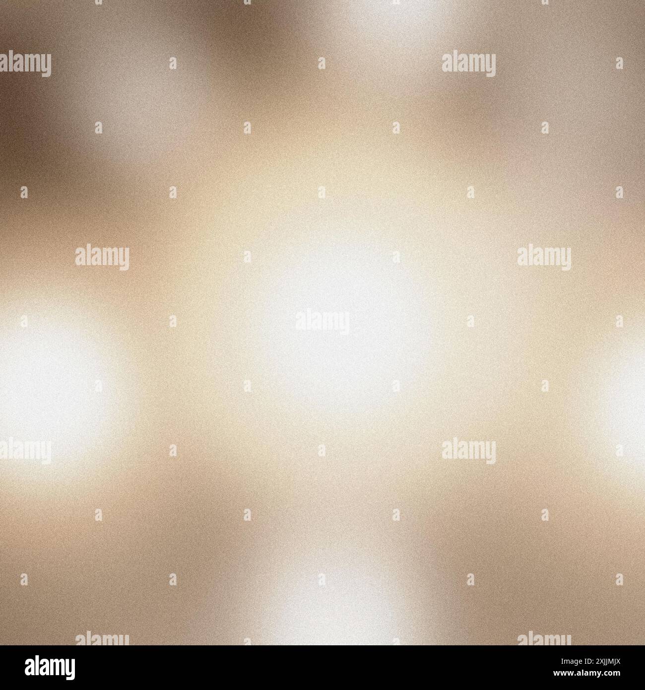 Abstract blurred grainy gradient background in light brown tones with a smooth, silky texture Stock Photo