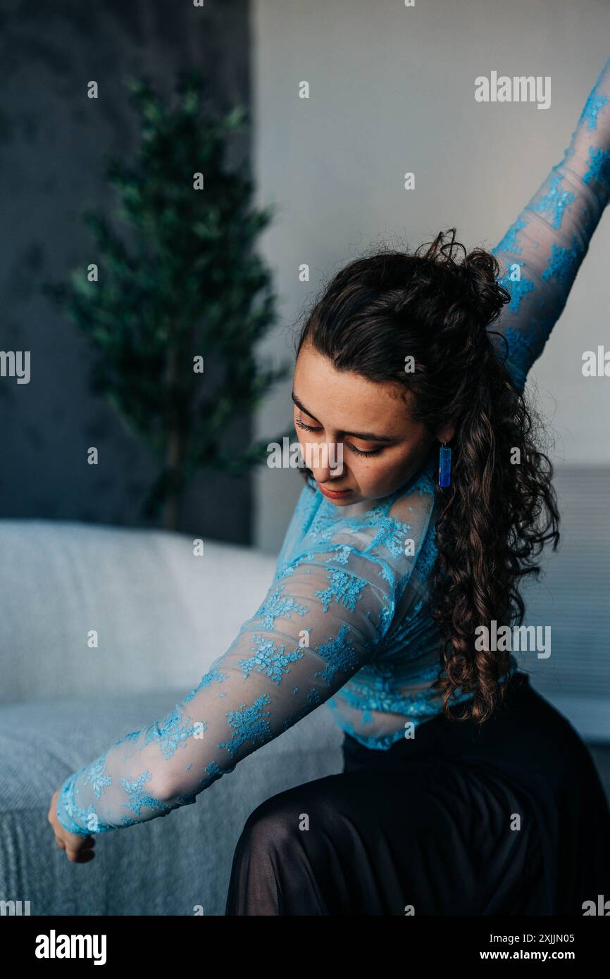 Woman in blue top hi-res stock photography and images - Alamy