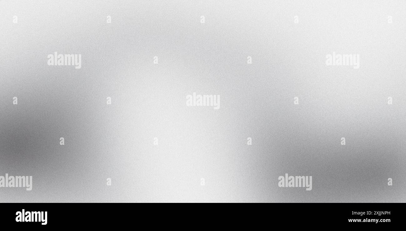Grainy texture creates a subtle pattern on a gray gradient background Stock Photo