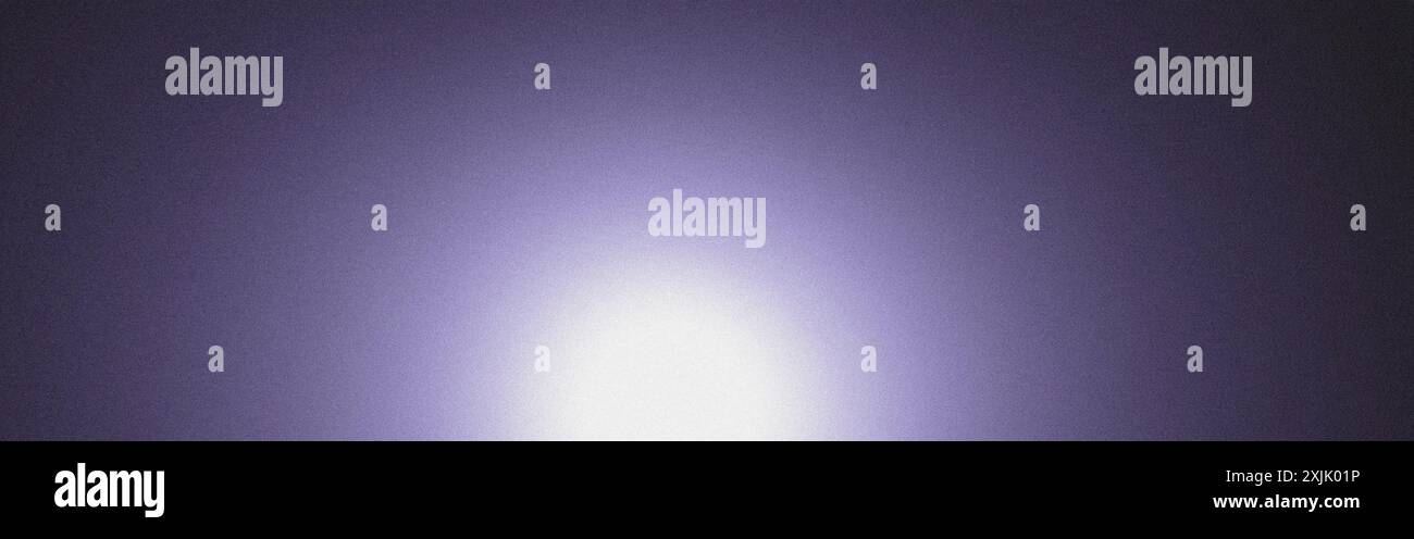 Purple grainy background with a bright centered light Stock Photo