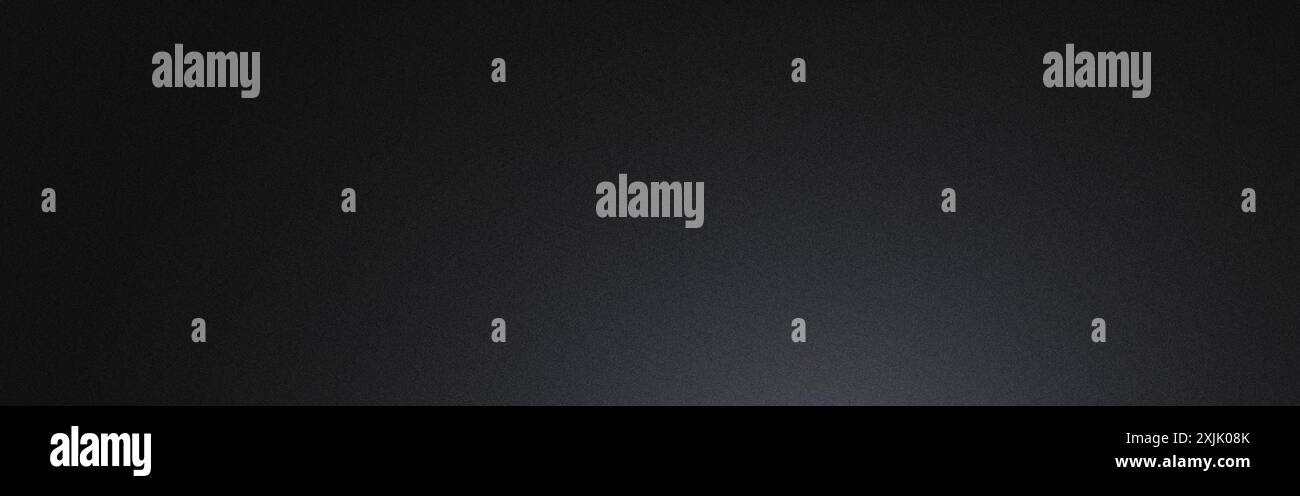 Dark grainy background with a slight gradient lighting from the bottom Stock Photo