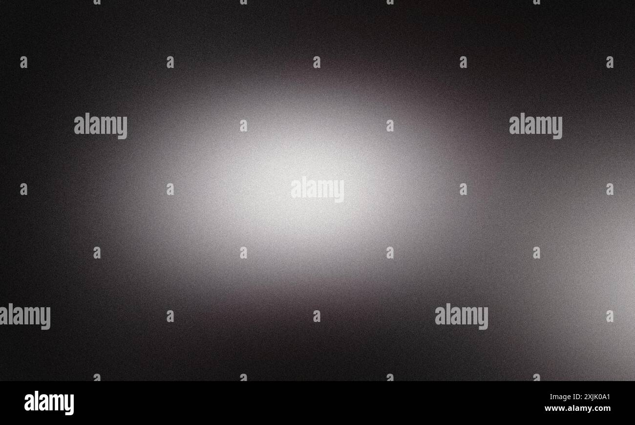 Subtle gradient background transitioning from black to white with a grainy texture Stock Photo