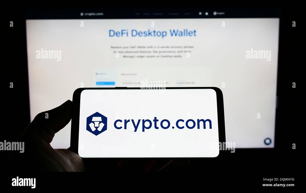 Stuttgart, Germany, 09-24-2022: Person holding cellphone with logo of crypto  company Foris DAX MT Limited (Crypto.com) on screen in front of webpage  Stock Photo - Alamy