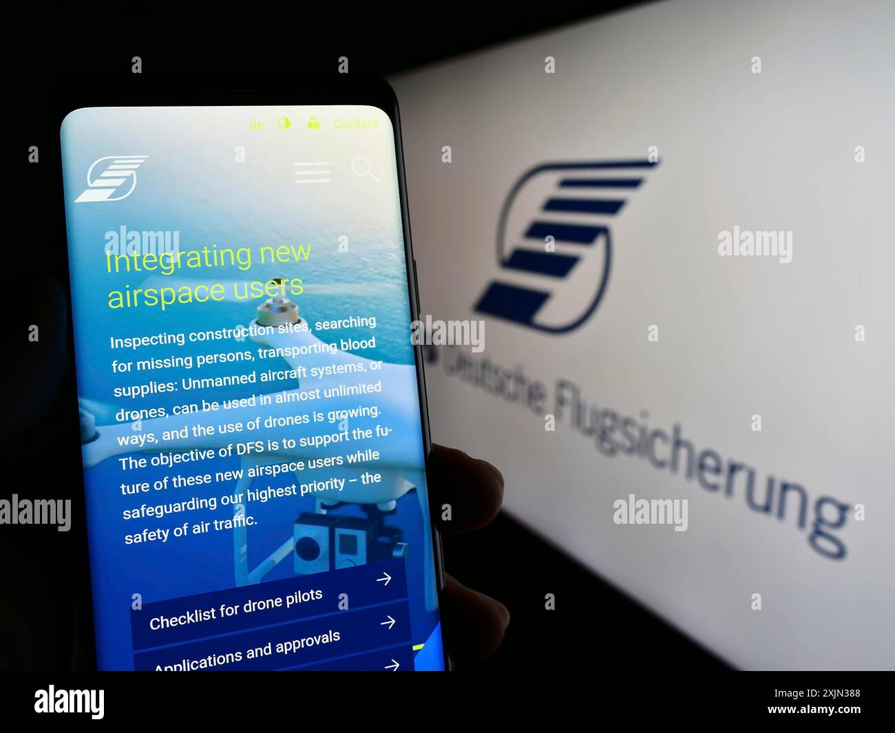 Stuttgart, Germany, 03-18-2023: Person holding smartphone with webpage ...