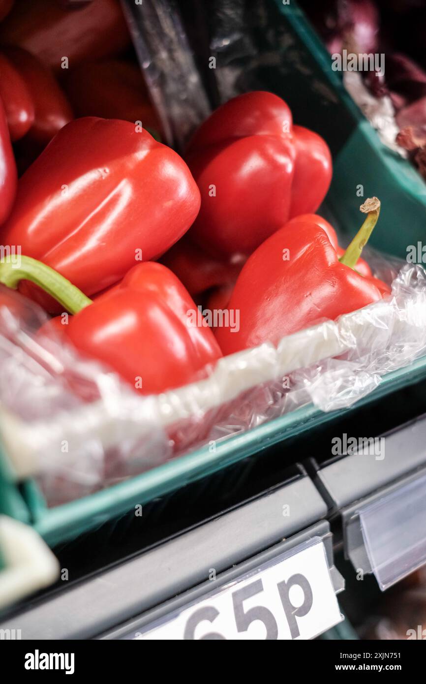 Peppers on sale in the isle of a super market Stock Photo - Alamy