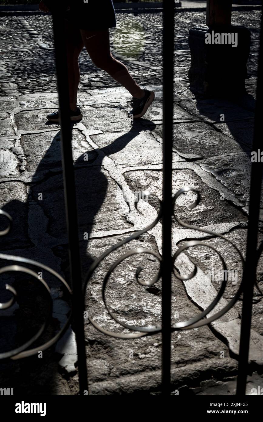 Person walking in the Spanish colonial-era city centre, Antigua, Guatemala, Central America Stock Photo