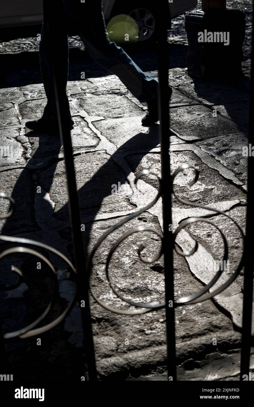 Person walking in the Spanish colonial-era city centre, Antigua, Guatemala, Central America Stock Photo
